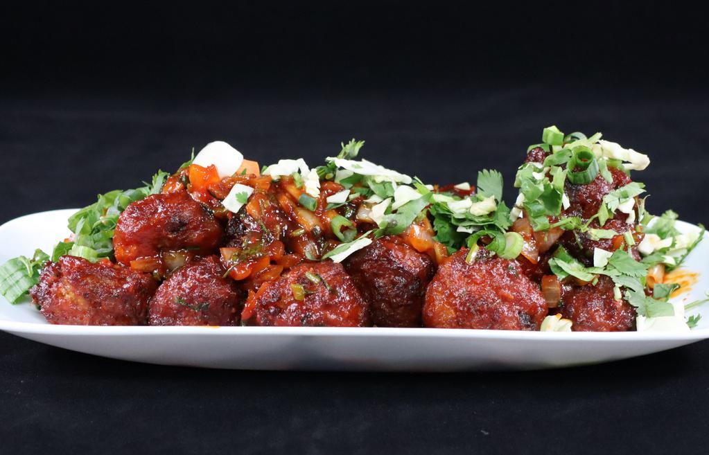 Vegetable Manchurian · Coated in a manchurian sauce made from scratch (ginger and garlic, soy sauce, chili sauces, and vinegar).