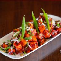 Paneer  Manchurian · Coated in a manchurian sauce made from scratch (ginger and garlic, soy sauce, chili sauces, ...