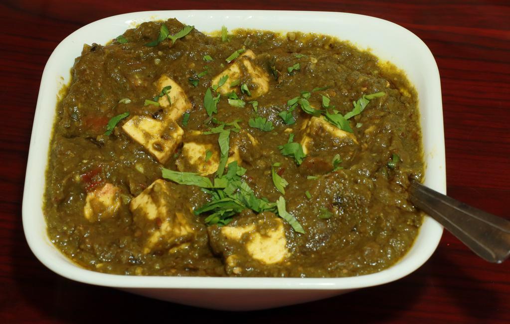 Saag Paneer · Paneer (cottage cheese) or channa (chick peas) cooked in a leafy based sauce, saag (spinach) with a touch of cream and spices.