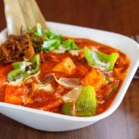 Paneer  Tikka Masala · A spicy twist to the butter masala, but with onions, bell peppers and our tikka masala.