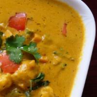 Mixed Vegetable Kurma · Mixed vegetables in coconut and cashew nut gravy.