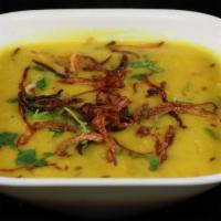 Dal Fry · Boiled toor dal (Bengal gram split and skinned) cooked with garlic and chilies.