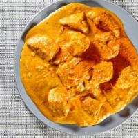 Chicken Tikka Masala · Tender chunks of chicken marinated in yogurt and cooked in a mild tomato sauce.