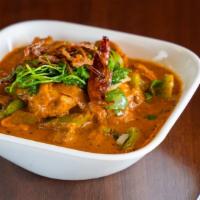Chicken Curry · Our special curry with south Indian style of cooking that's a tad spicy, tangy and tasty.