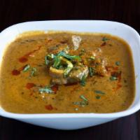 Dum Ka Goat · Meat gently simmered over a slow fire and cooked in a hyderabadi influenced gravy.