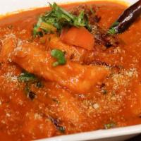 Fish Curry · Our special curry with south Indian style of cooking that's a tad spicy tangy and tasty.