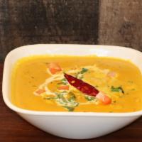 Shrimp Kurma · Shrimp cooked in a coconut and cashew gravy. Enjoyed best with a Kerala parotta (in the brea...