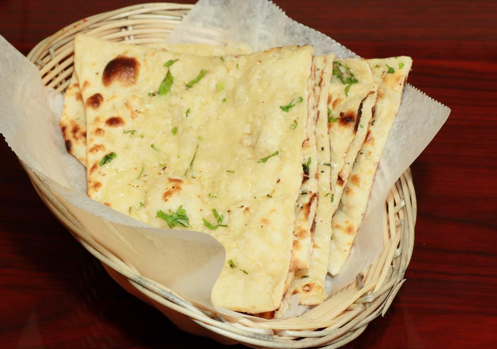 Bullet Naan · Bread seasoned with thai hot and cilantro (extremely spicy).