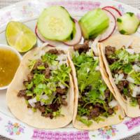 Tacos Orden(3 Tacos Steak) · Served with onion, cilantro, radish, and cucumber.