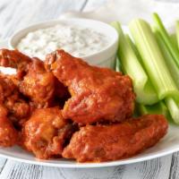 Wings · Deep-fried chicken wings tossed in your choice of sauce, served with celery and bleu cheese ...