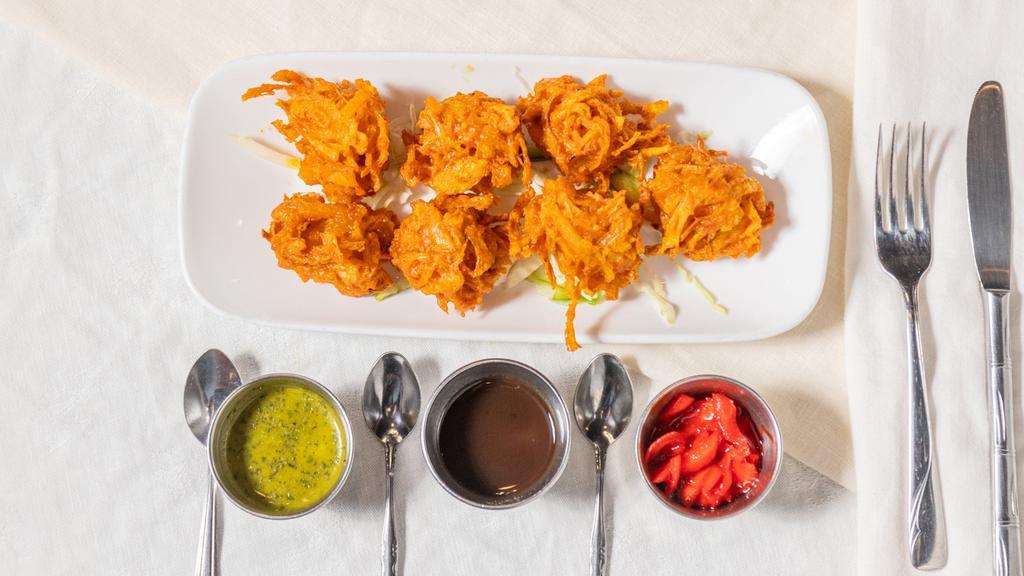Vegetable Pakora · Fresh vegetables dipped in a delicately spiced batter and deep fried.
