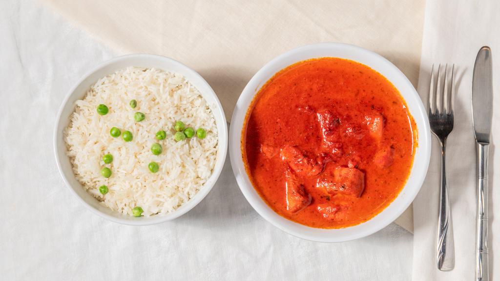 Chicken Tikka Masala · Chicken cubes broiled in tandoor and cooked in a mild tomato and onion cream sauce.