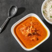 Chicken Curry · Traditional Indian chicken curry with freshly grounded spices.