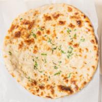 Garlic Naan · Fresh garlic and coriander seasoned naan.