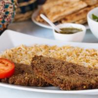 Chablee Kabob · Ground beef mixed with onions, garlic and spices served with afghan rice, afghan salad and a...