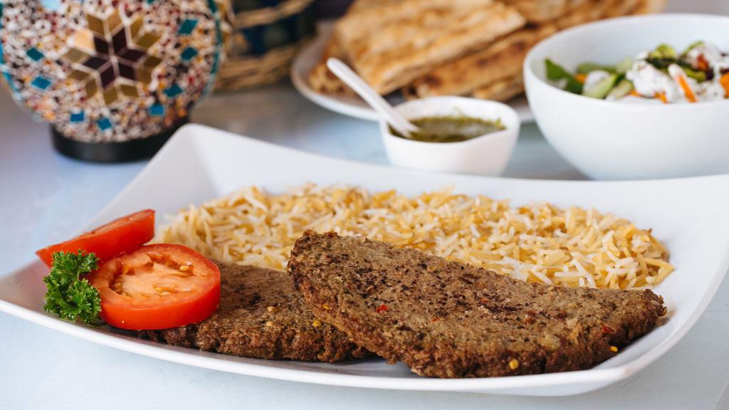 Chablee Kabob · Ground beef mixed with onions, garlic and spices served with afghan rice, afghan salad and afghan bread.