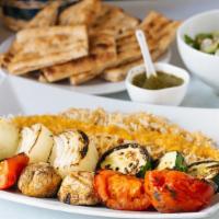Vegetarian Kabob · Onions, peppers, squash and mushrooms cooked on (2) skewers served with afghan rice, afghan ...