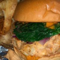 Slam'N Seafood Burger · Shrimp, crab meat, salmon, red onions, spinach, Pepper Jack cheese, and special sauce.