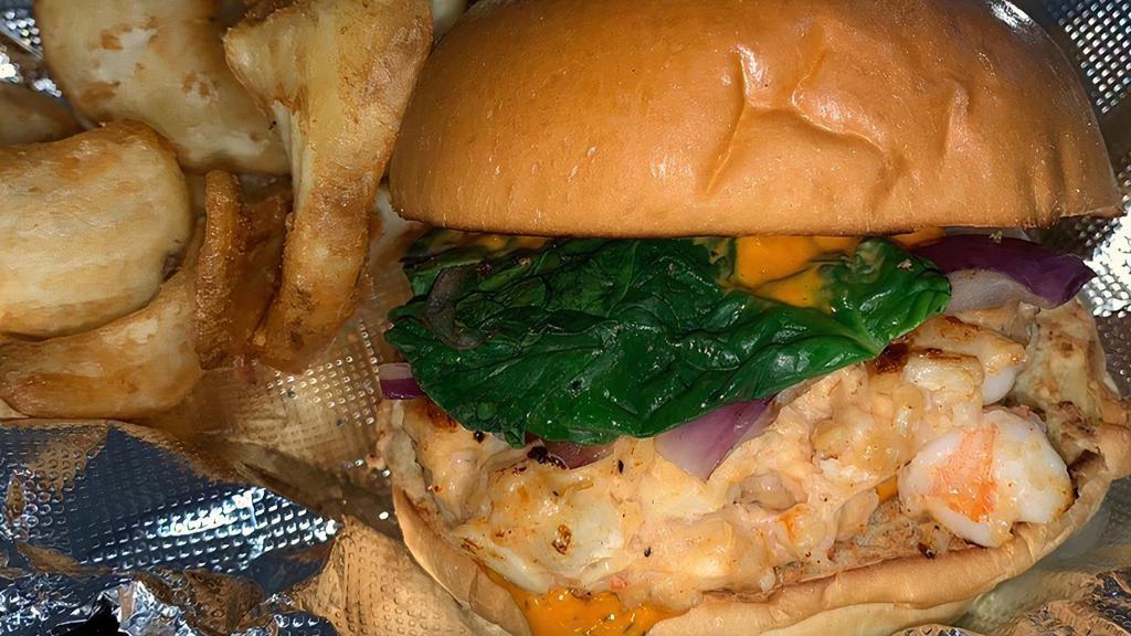 Slam'N Seafood Burger · Shrimp, crab meat, salmon, red onions, spinach, Pepper Jack cheese, and special sauce.