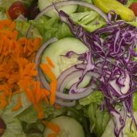 Tossed Salad · Syrian Bread, House, Red Onions, Lettuce, Tomato, Cucumbers, Carrots, Red Cabbage, Olives an...