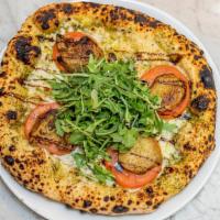 Norma · Vegan pesto,vegan mozzarella,eggplant,tomatoes,arugula,oregano,balsamic glaze