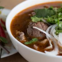 Bún Bò Huế · Spicy. Hue city soup. Spicy beef lemongrass with large vermicelli soup. Choose slices eye ro...