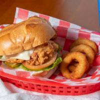 Crispy Chicken Burger Combo · Build Your Own Burger. Made with  Crispy chicken Breast And Cheese. Comes w/ Fries and Bever...
