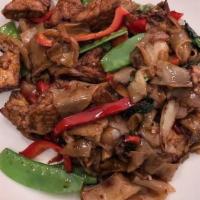 Drunken Noodles · Mushroom, snow pea, onion, red pepper, Thai Basil, chili.