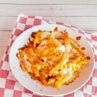 Buffalo Chicken Fries · Chopped grilled chicken with our homemade buffalo sauce and topped with melted crumbled Bleu...