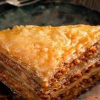 Baklava · Layered phyllo dough and chopped walnuts infused with honey syrup.