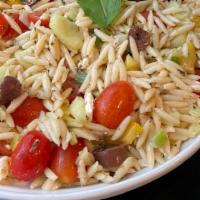 Greek Orzo Pasta Salad · Cherry tomatoes, Kalamata olives, bell peppers, diced red onion, feta cheese and orzo dresse...