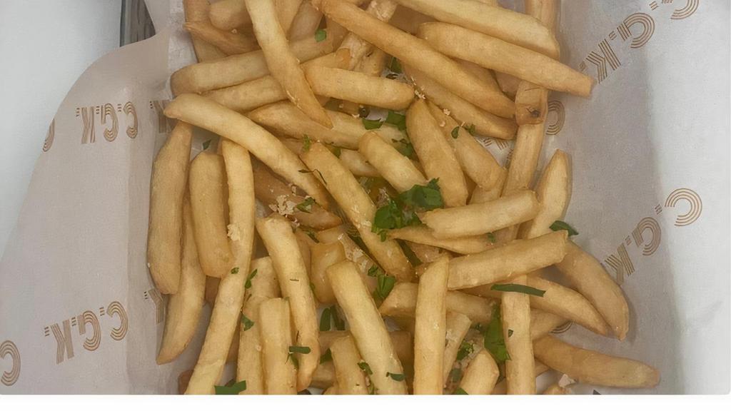 Parmesan Truffle Fries · Drizzle of Truffle oil, Shredded Parmesan Cheese, Salt and Chopped Fresh Parsley.