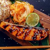 Grilled Salmon Over Rice  · Fresh grilled salmon with house seasoning over fresh boiled rice.