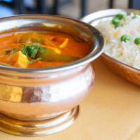 Kadai Paneer Makhani · Homemade cheese cooked with bell peppers onions, tomatoes and freshly ground spices in an au...