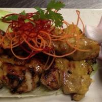Satay Beef Or Chicken · Marinated beef or chicken grilled on skewers served with peanut sauce.
