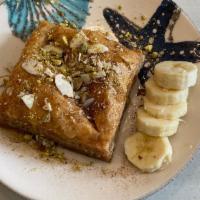 Baklava · Traditional Honey-Soaked Filo Pastry, Filled with Walnuts, Almonds & Pistachios.