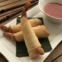 Shrimp In Blanket · Gluten-free. Fried whole shrimp wrapped in rice flour roll, served with sweet chili sauce.