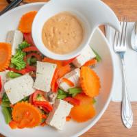 Tofu Garden · Gluten-free. Steamed tofu, broccoli, carrots, bell peppers, string beans, and mushrooms, ser...