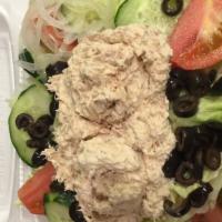 Tuna Supreme Salad · Crisp lettuce, our homemade tuna salad with tomatoes and onions.
Add any dressing choice