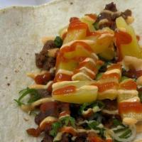 Korean Al Pastor Taco · korean bbq-marinated spicy pork, pineapple, onion, cilantro