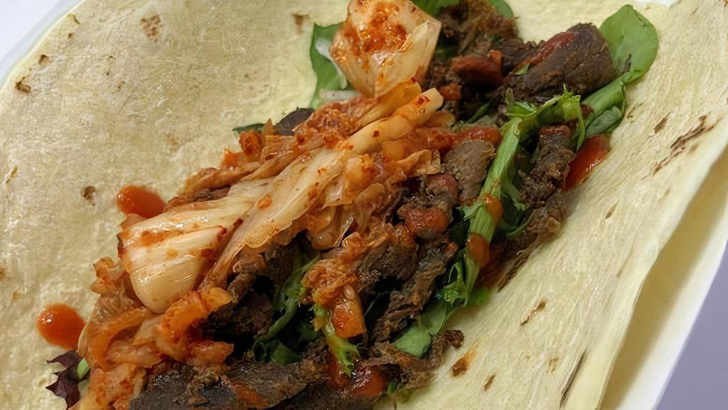 Steak (Bulgogi) Taco · korean bbq-marinated ribeye,  chopped kimchi