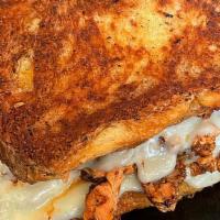 Salmon Grilled Cheese · Chopped grilled salmon with Cooper sharp cheese on Texas toast.