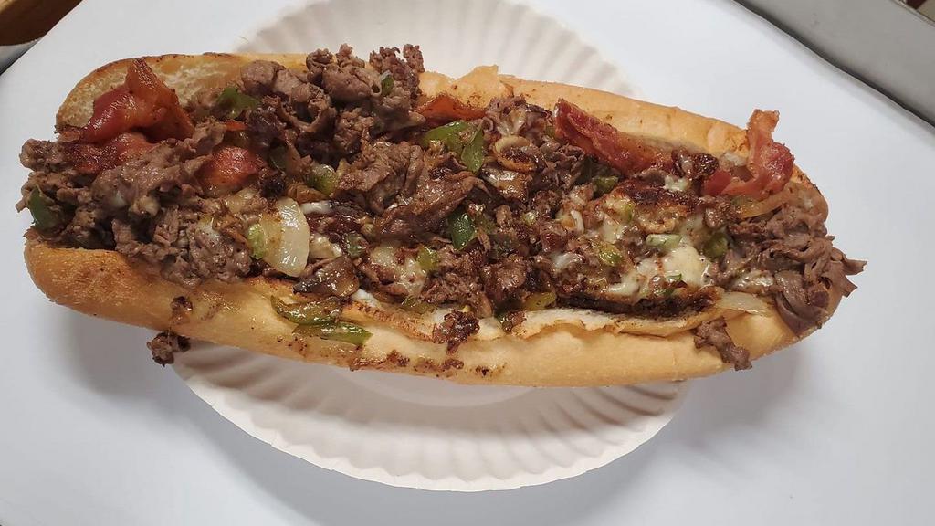 Steak Bomb Sub With Cheese · Steak, sausage, onion, pepper, mushrooms and cheese.