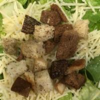 Caesar Salad · Romaine lettuce, shredded parmesan, housemade croutons, caesar dressing.