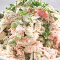 Seafood Salad · This seafood salad is a tasty blend of creamy and crunchy with chunks of imitation crabmeat,...