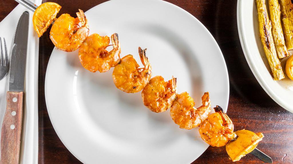 Grilled Jumbo Shrimp · Grilled Jumbo Shrimp seasoned with paprika, wine, onion, parsley and garlic