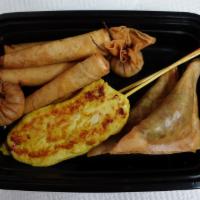 Combo · A platter of mixed satay two skewers, two pieces of treasure bag, two pieces of chicken spri...