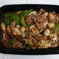 Hot Basil · Sliced chicken or	beef	sautéed in	hot chili garlic	sauce	with mushrooms, bell	peppers and ar...