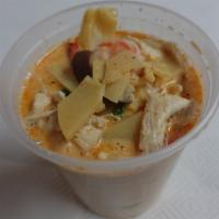 Red Curry · Red chili curry and coconut milk with bamboo shoots,	eggplants,bell peppers, and basil leaves.