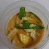 Mango Curry · Yellow	madras curry, and	coconut milk with chunks	of fresh mango, green peas, onions, snow p...